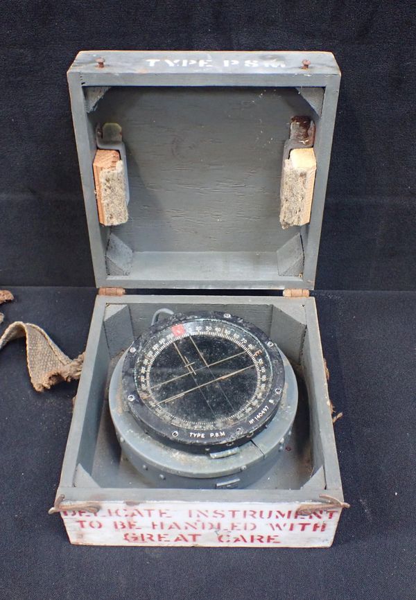 A WWII BOXED COMPASS