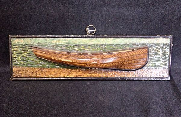 A FOLK ART HALF MODEL BOAT