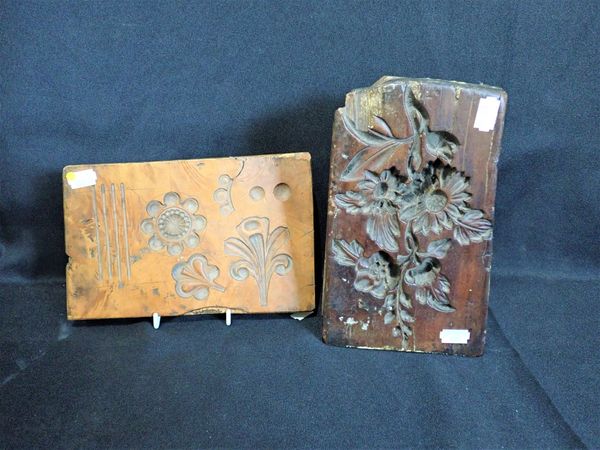 TWO CARVED FRUITWOOD MOULDS