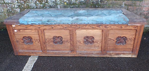 A VICTORIAN GOTHIC PITCH PINE WINDOW SEAT OTTOMAN