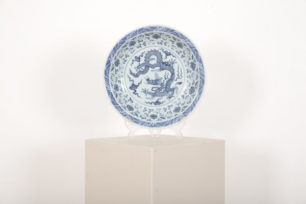 A CHINESE BLUE AND WHITE DRAGON DISH