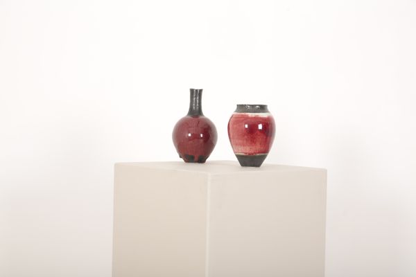 *EDDIE CURTIS (b. 1953) TWO COPPER RED BODIED VASES