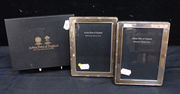 A PAIR OF MODERN SILVER PHOTOGRAPH FRAMES