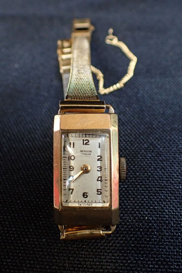 A LADIES' BENSON 9CT GOLD CASED WRISTWATCH