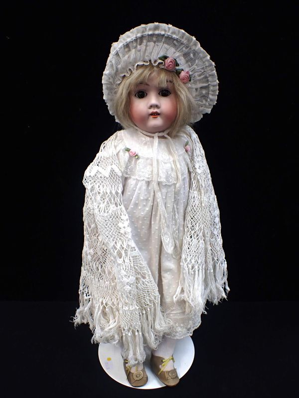 A MAX HANDWERCK GERMAN BISQUE HEADED DOLL