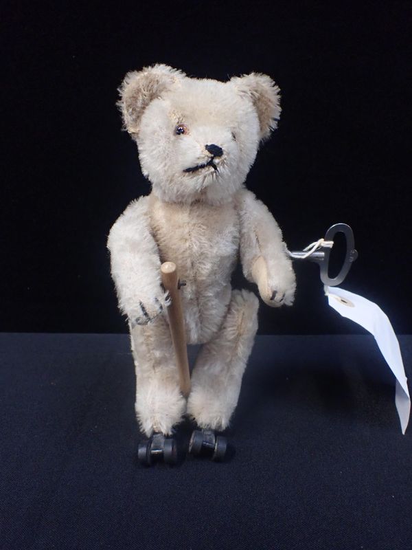 A SCHUCO ROLLY ROLLERSKATING BEAR