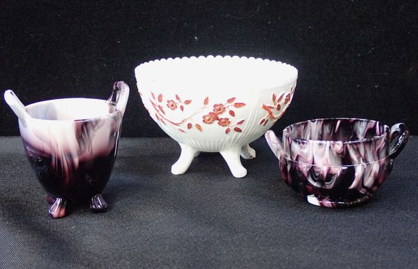 A SOWERBY PURPLE SLAG GLASS BOWL