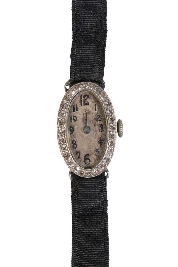 A LADY'S PLATINUM & DIAMOND-SET COCKTAIL WATCH