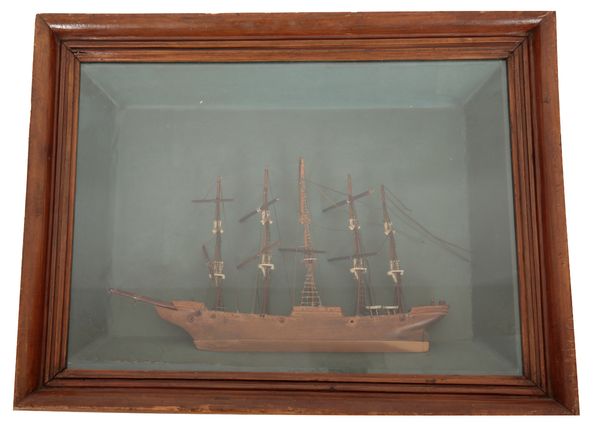 A MODEL SAILING SHIP DIORAMA