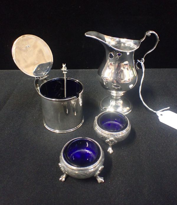 A PAIR OF VICTORIAN SILVER SALTS, ON FEET