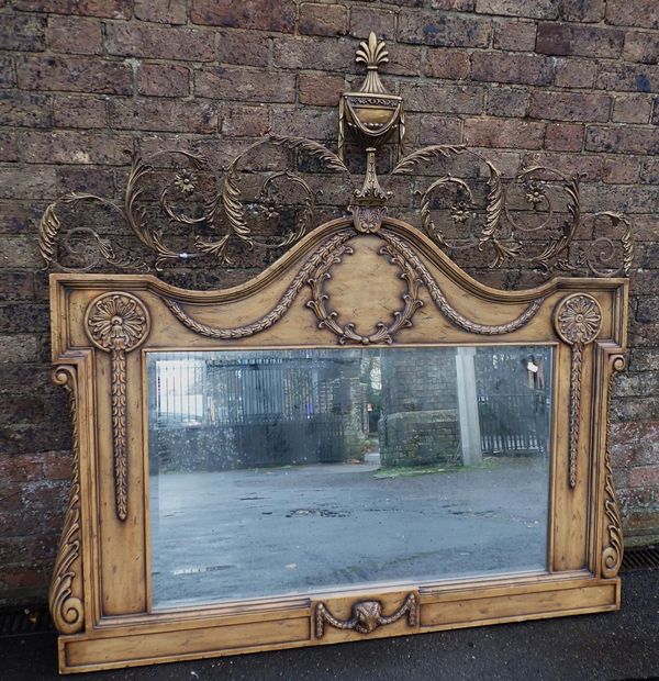 A LARGE COMPOSITION FRAMED WALL MIRROR