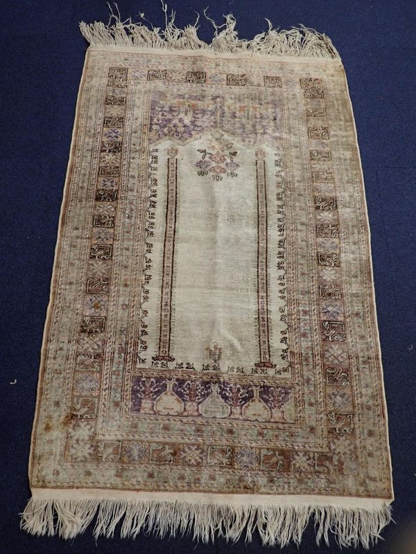 AN ANATOLIAN TURKISH COTTON AND SILK PRAYER RUG