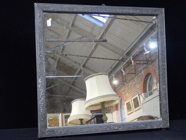 AN ARTS AND CRAFTS STYLE LEAD/PEWTER  COVERED FRAMED MIRROR