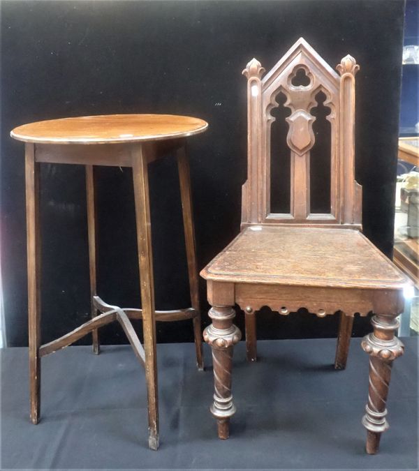 A VICTORIAN GOTHIC OAK HALL CHAIR