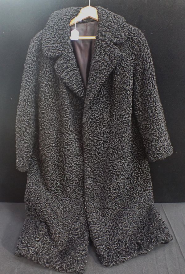 A VINTAGE ASTRAKHAN FUR COAT