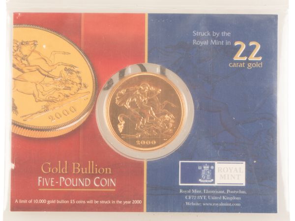 A 2000 QUEEN ELIZABETH II MILLENIUM £5 GOLD COIN