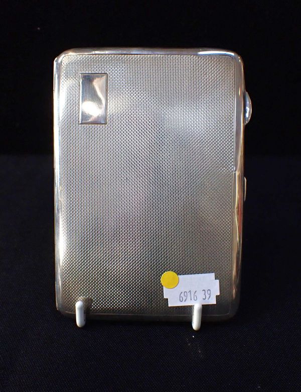 A SILVER CIGARETTE CASE