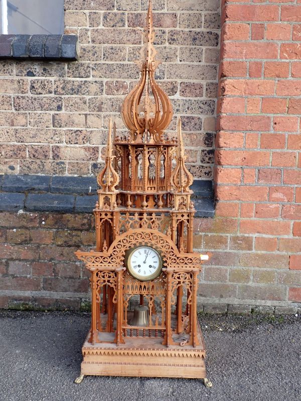 AN IMPRESSIVE FRETWORK CASED CLOCK