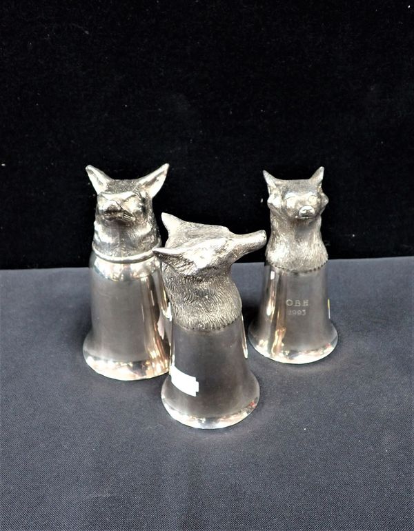 THREE SILVER-PLATED FOX HEAD STIRRUP CUPS