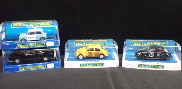 FOUR SCALEXTRIC CARS