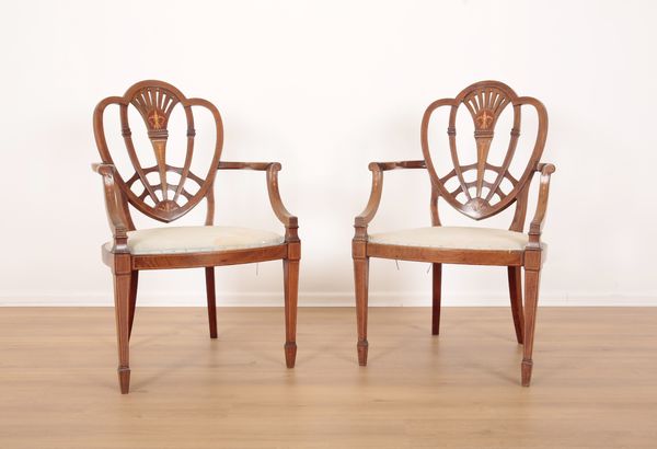 A PAIR OF EDWARDIAN MAHOGANY ARMCHAIRS IN HEPPLEWHITE STYLE