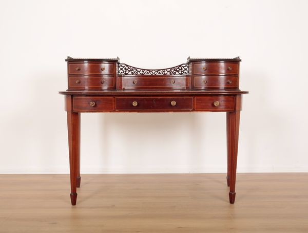 A GEORGE III FIGURED MAHOGANY DESK