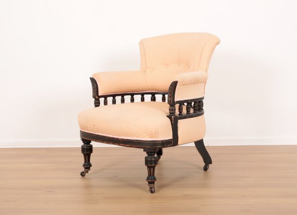 A LATE VICTORIAN EBONISED AND PARCEL GILT ARMCHAIR OF AESTHETIC DESIGN