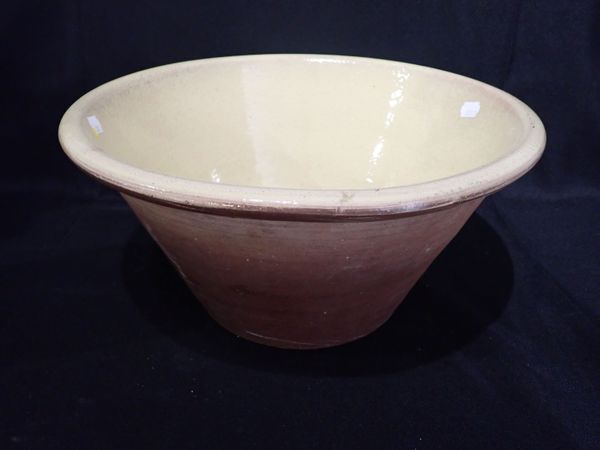 AN EARTHENWARE DAIRY OR MIXING BOWL