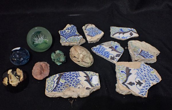 A COLLECTION OF PERSIAN TILE FRAGMENTS, A CARVED SCARAB BEETLE