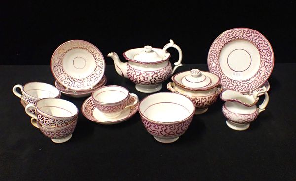 A VICTORIAN CHILD’S PINK LUSTRE PART TEA SERVICE