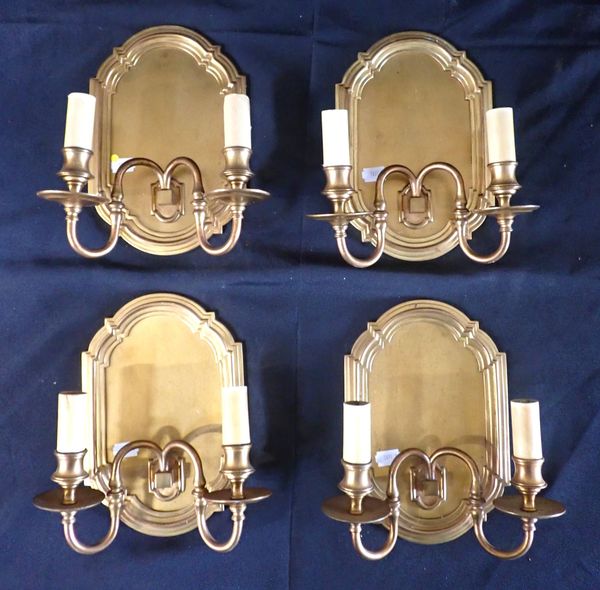 A SET OF FOUR GILT BRASS WALL SCONCES