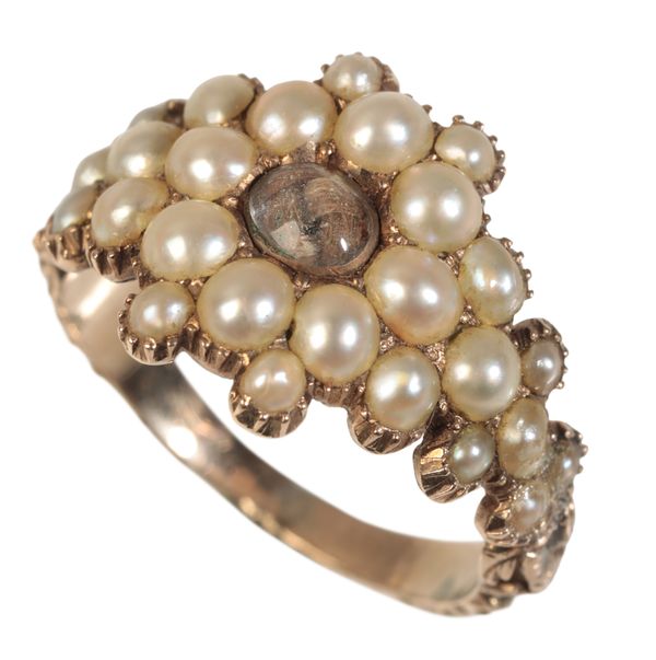 A REGENCY SEED PEARL MOURNING RING