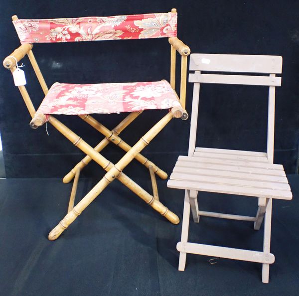 A CHILD'S FOLDING CHAIR WITH FAUX BAMBOO FRAME