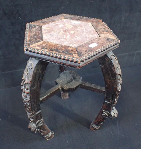 A CHINESE HARDWOOD AND ROUGE MARBLE JARDINIERE STAND