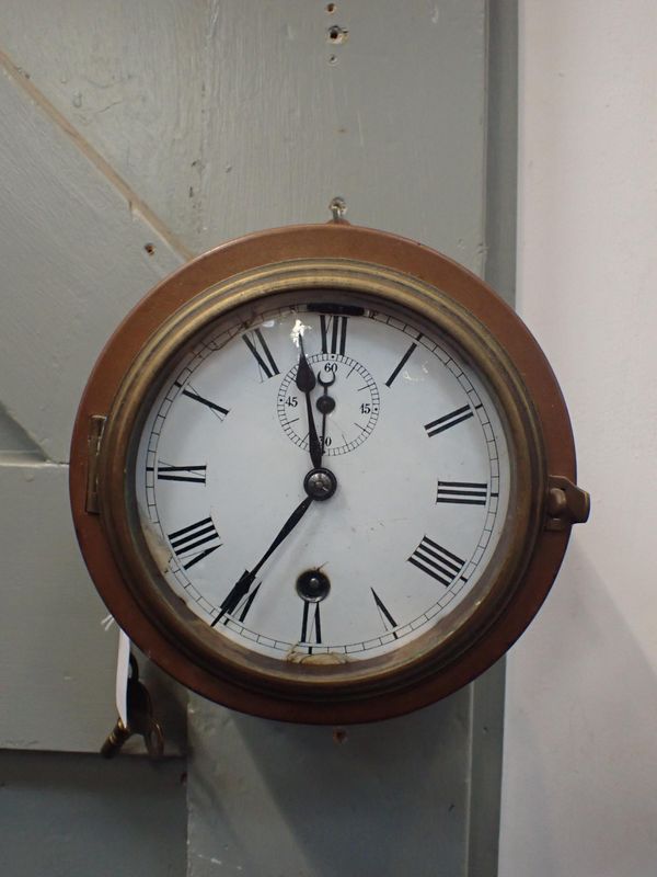 A 19th CENTURY SHIP'S CLOCK