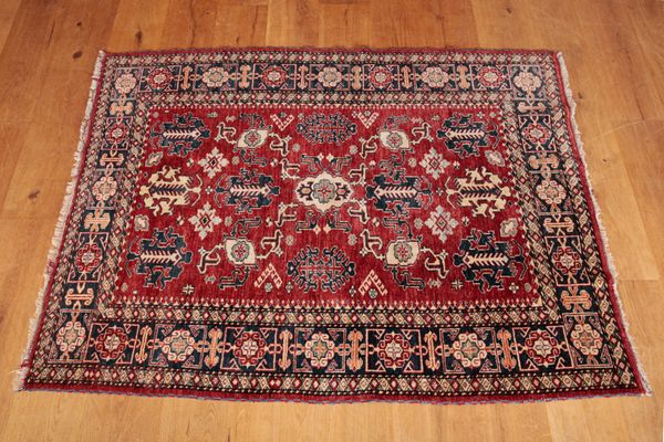 A NORTHWEST PERSIAN HERIZ STYLE RUG