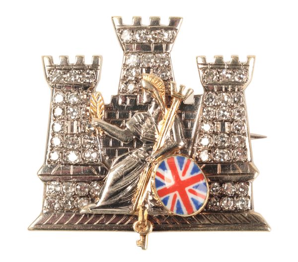 A ROYAL ANGLIAN 1ST BATTALION DIAMOND SET GOLD BROOCH