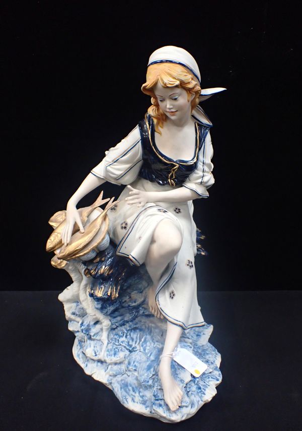 EDOARDO TASCA, CAPODIMONTE; A LARGE FIGURINE OF A FISHER GIRL