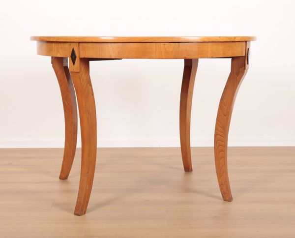 A BIEDERMEIER STYLE SATINWOOD CENTRE TABLE