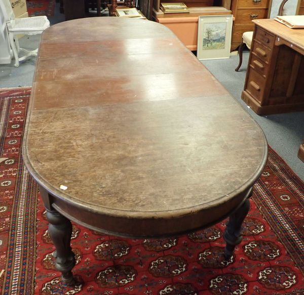 A VICTORIAN  MAHOGANY DINING TABLE, WITH WIND-OUT  EXTENDING ACTION