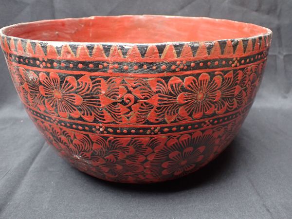 AN EASTERN RED PAINTED LACQUER BOWL