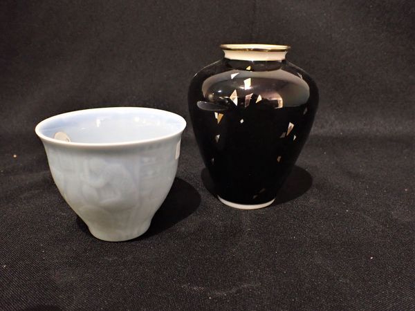 A KPM PORCELAIN MINIATURE VASE