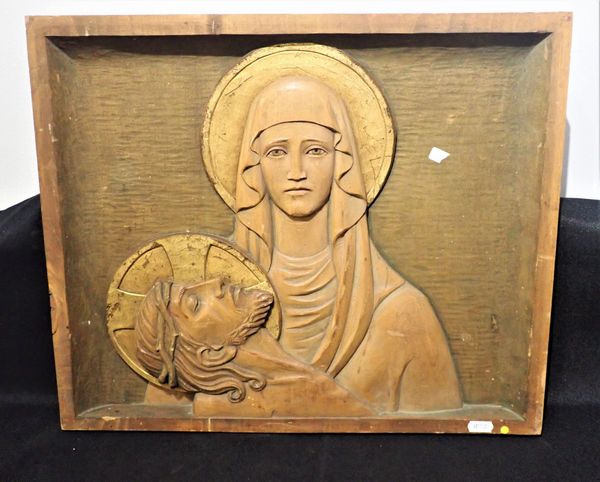 A CARVED PINE AND PAREL GILT  PANEL DEPICTING JESUS AND MARY MAGDALENE