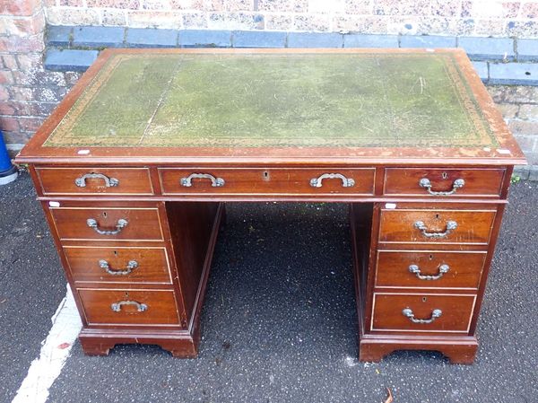 A GEORGE III STYLE MAHOGANY PEDESTAL DESK