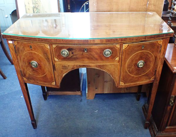 A GEORGE III MAHOGANY BOWFRONT SIDEBOARD