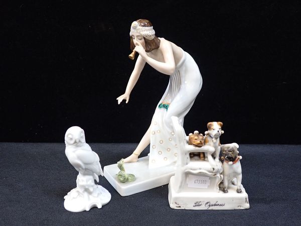 A ROSENTHAL LADY PIPING A FROG