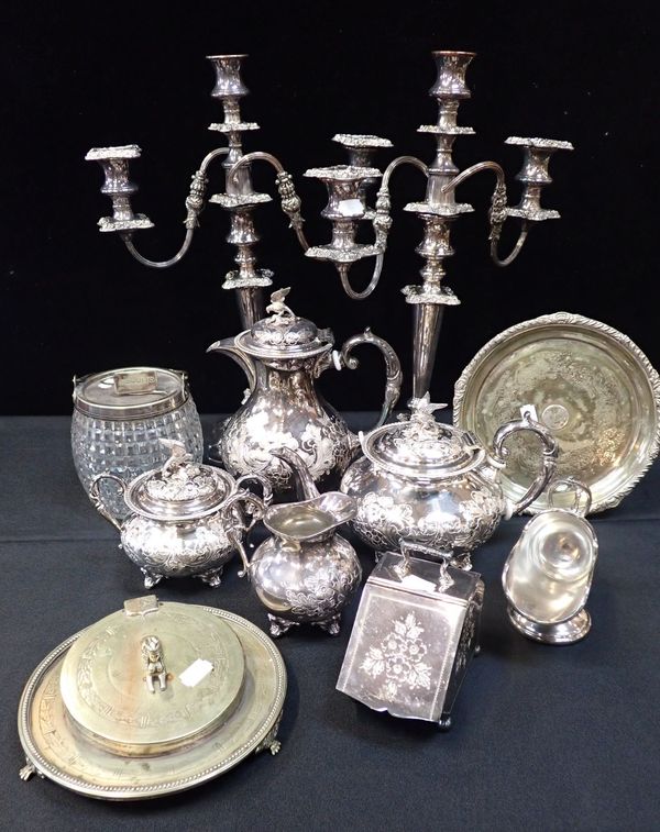 A PAIR OF SILVER-PLATED CANDELABRA