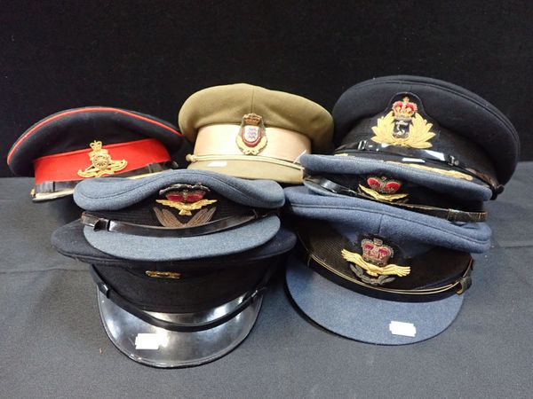 A COLLECTION OF MILITARY OFFICERS HATS