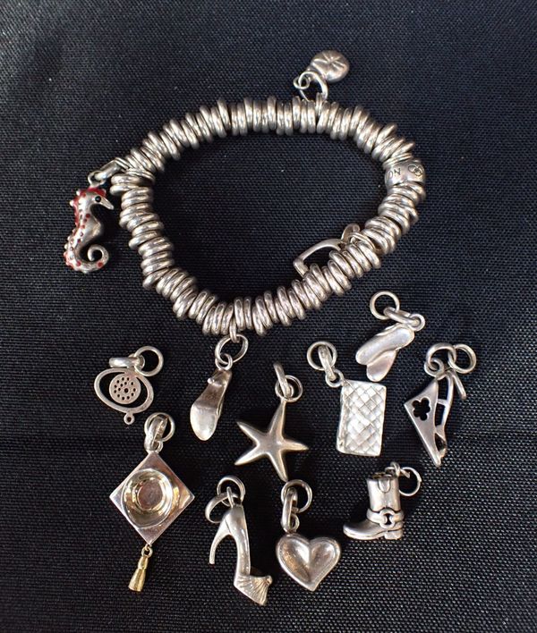 A LINKS OF LONDON SILVER CHARM BRACELET