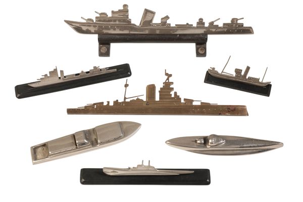 A COLLECTION OF GUNMETAL SHIPS AND SUBMARINES WITH STANDS